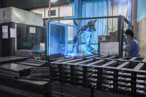ISO 9001-certified automated tapping machine threading Contuo standing desk parts at ±0.005mm tolerance, 45-second cycle time per unit, operator-assisted CNC control under ISO 13849 safety standards