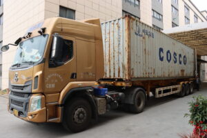 2×40ft containers loading 300+ Contuo electric standing desks at CONTO facility.